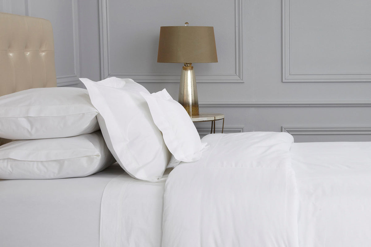 Peter Reed White Bedding on Bed