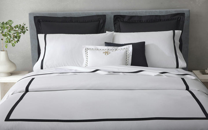 Neatly Made bed featuring Matouk Lowell Bedding