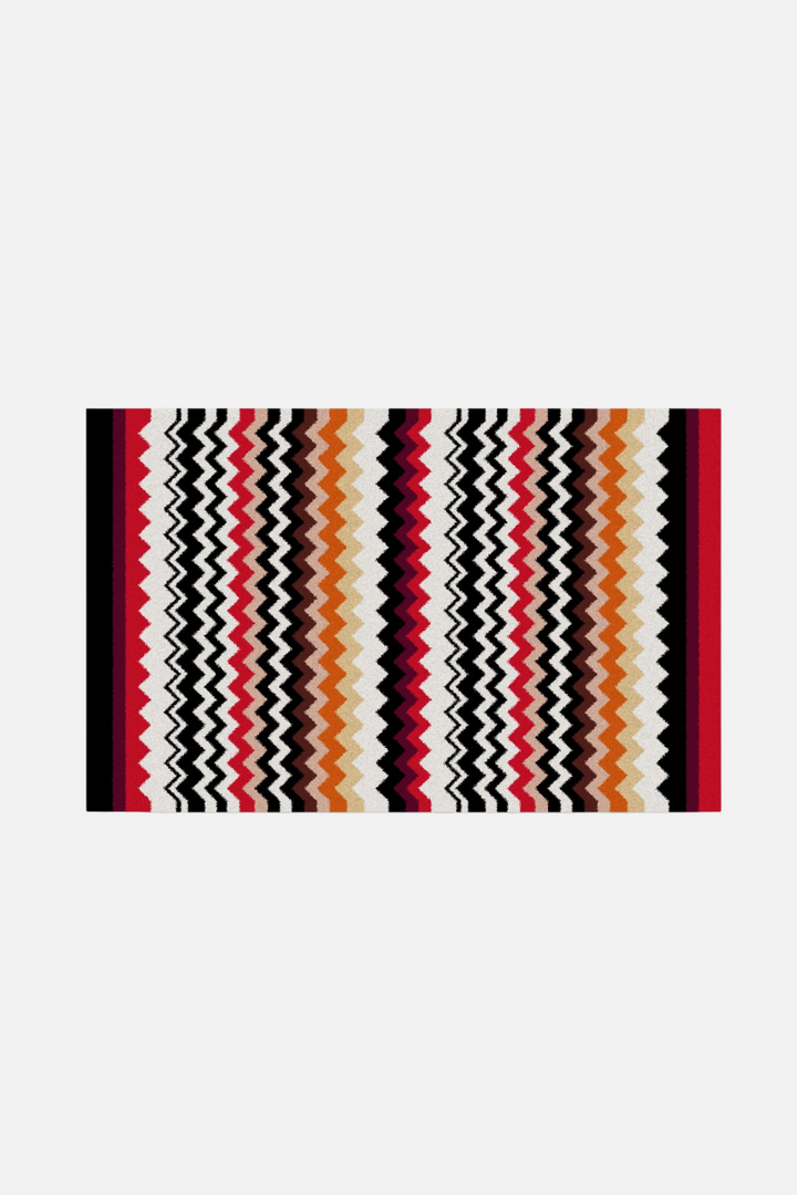 Best 156 Perrault rectangular bath mat with a colorful zigzag pattern on a white background