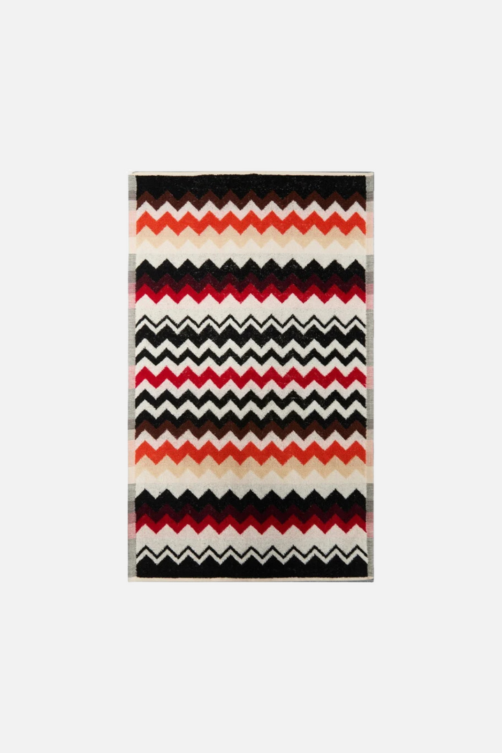 Best 156 Perrault striped bath mat with black, red, and beige pattern on a white background