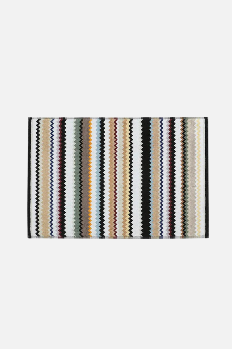 Perrault Curt 160 bath mat with striped pattern on a white background