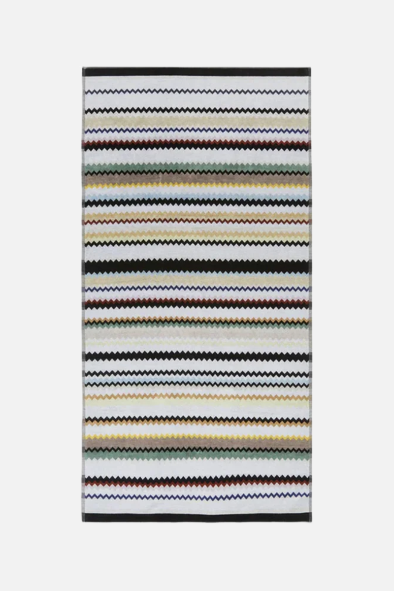 Striped rug with multicolor pattern on a white background
