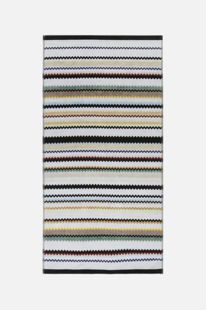 Striped rug with multicolor pattern on a white background