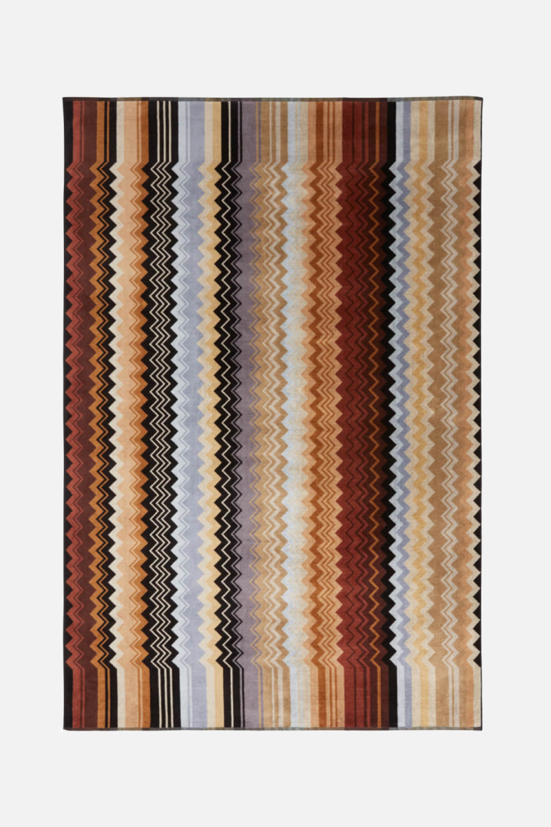 Striped rug with wavy pattern on a white background