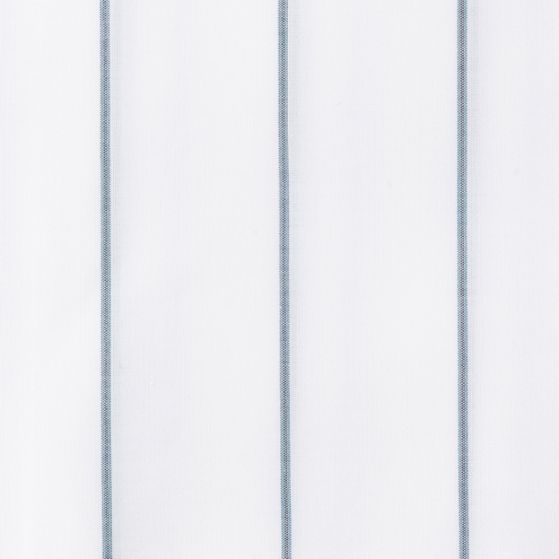 Close-up of Matouk Amalfi white fabric with subtle blue stripes.