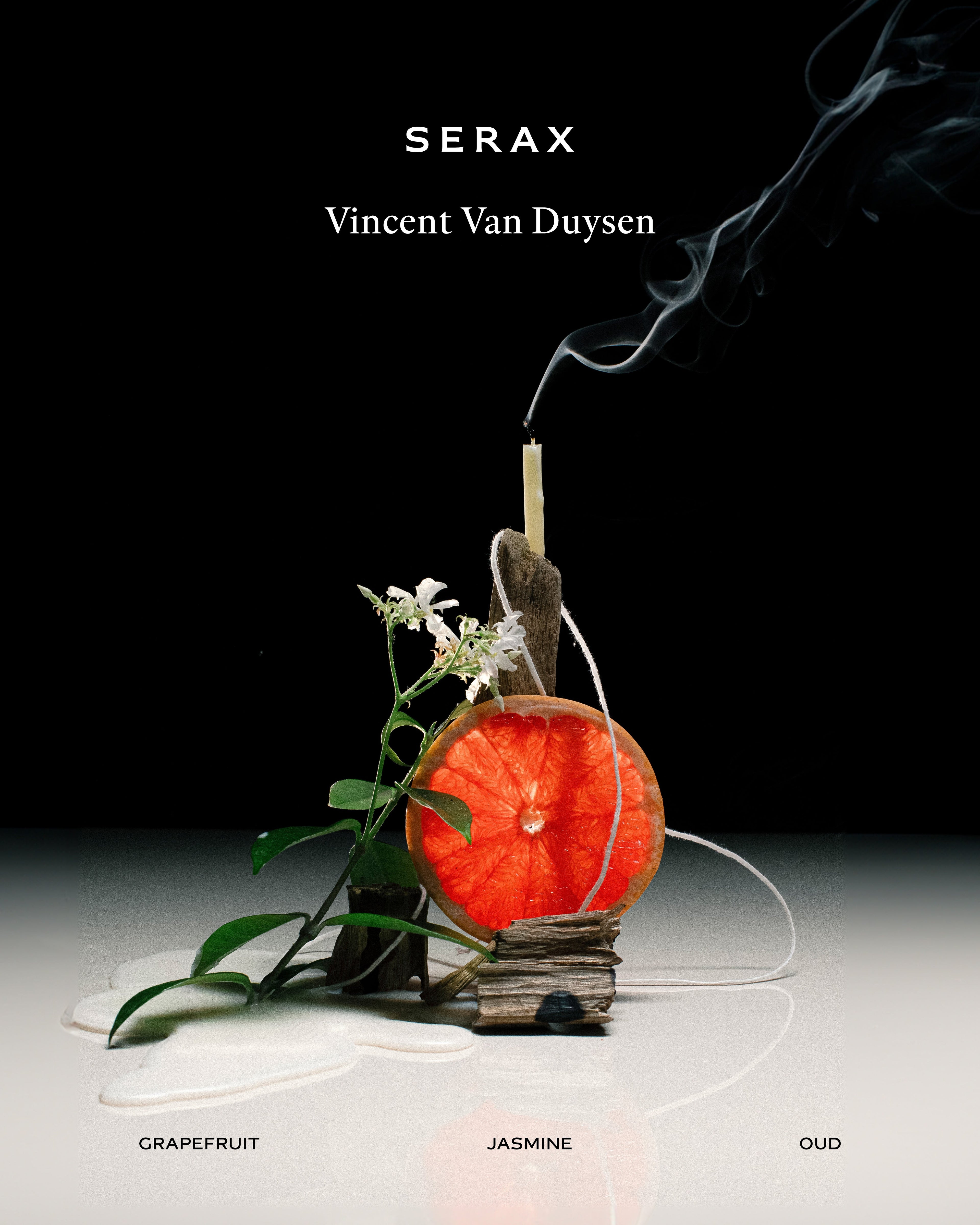 Serax candle with grapefruit, jasmine, and oud scents on a dark background