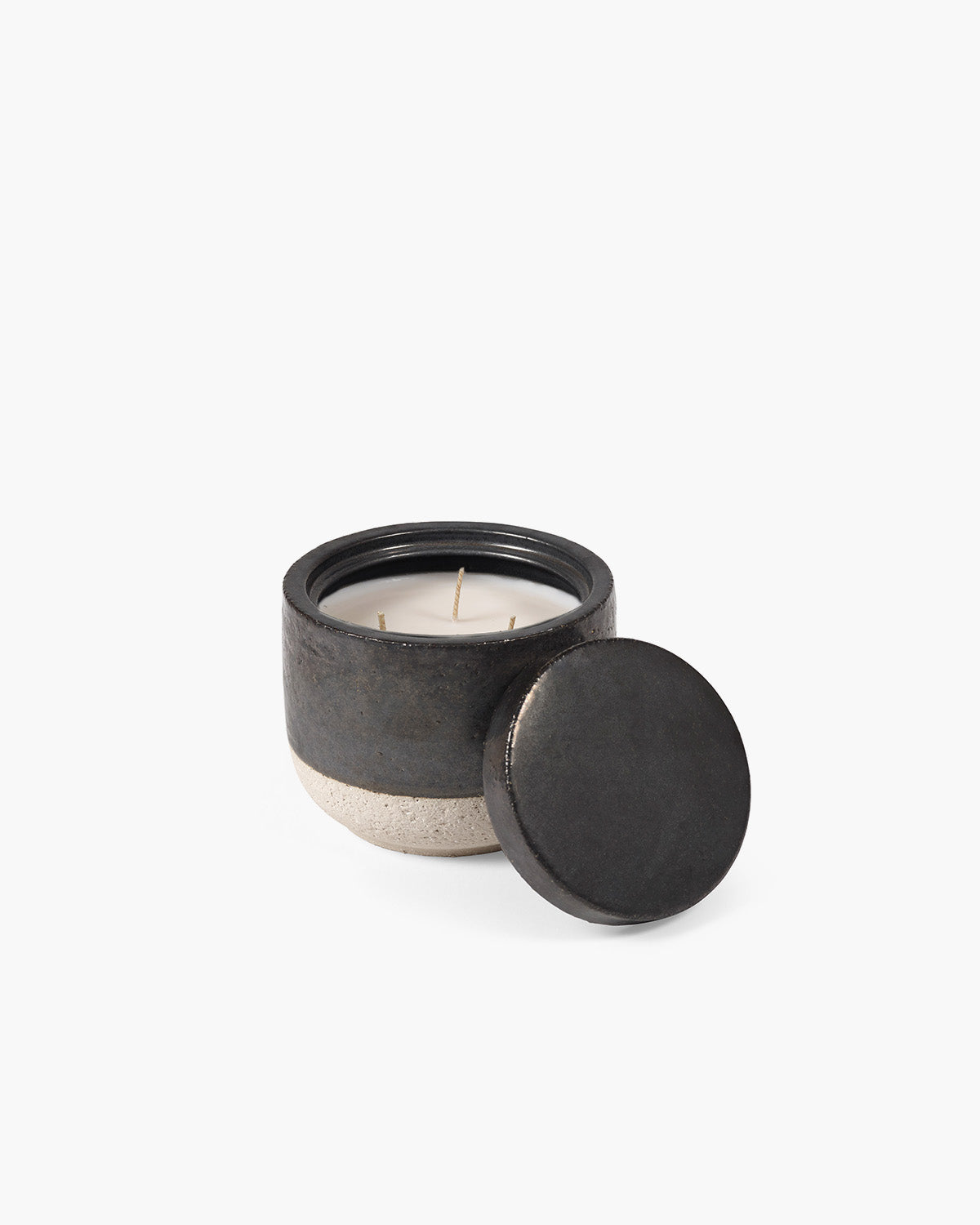 Ceramic candle with black lid on a white background Serax Piet Boon
