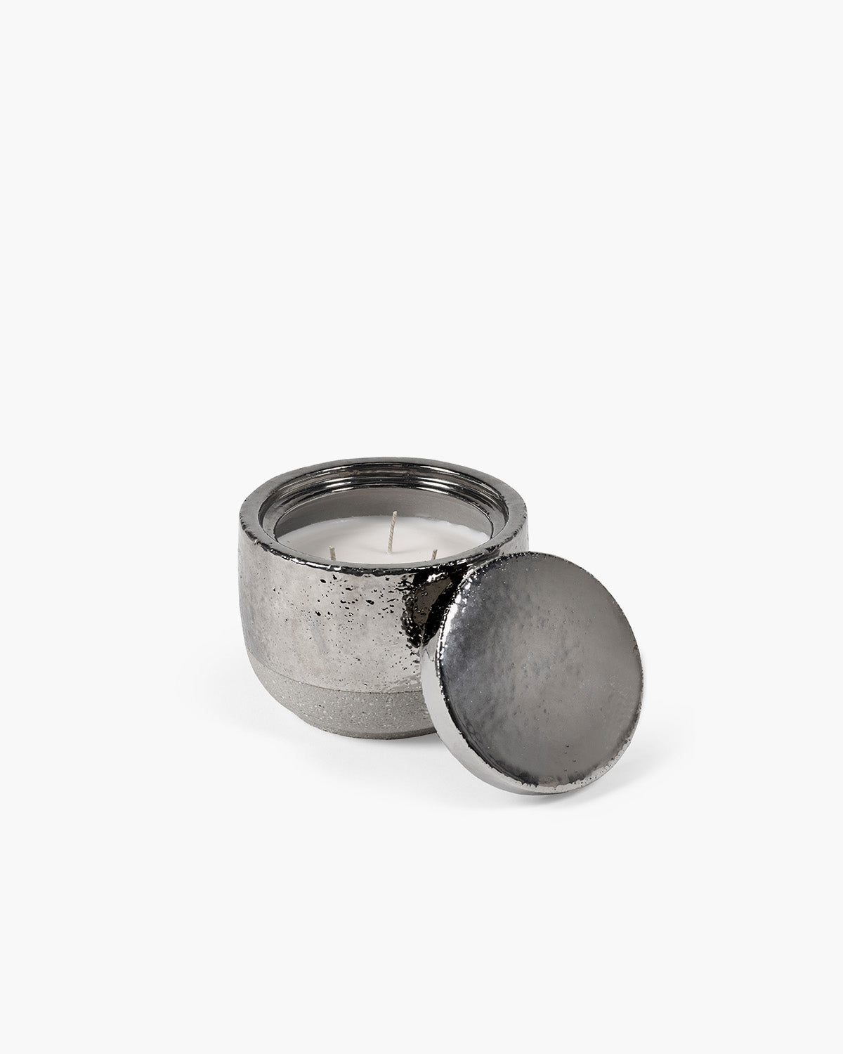 Silver metal candle with lid on a white background Serax Piet Boon
