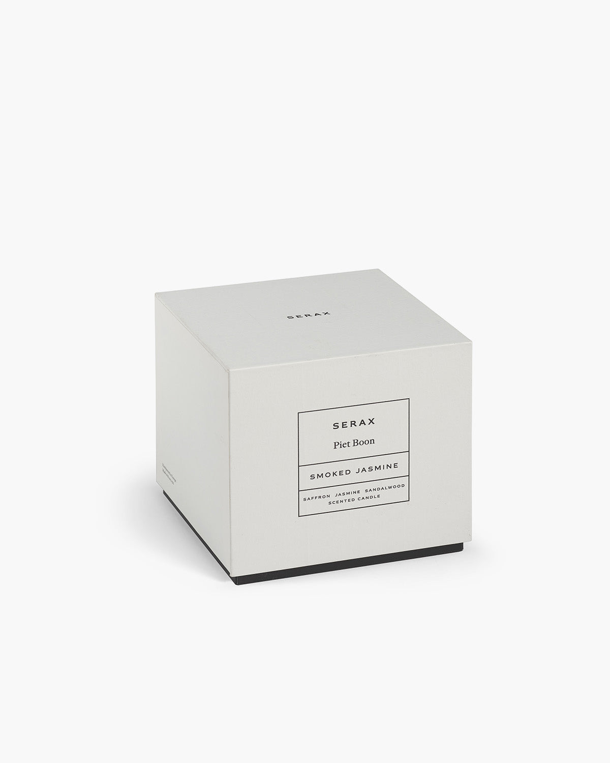 White candle box with 'Serax' branding on a white background