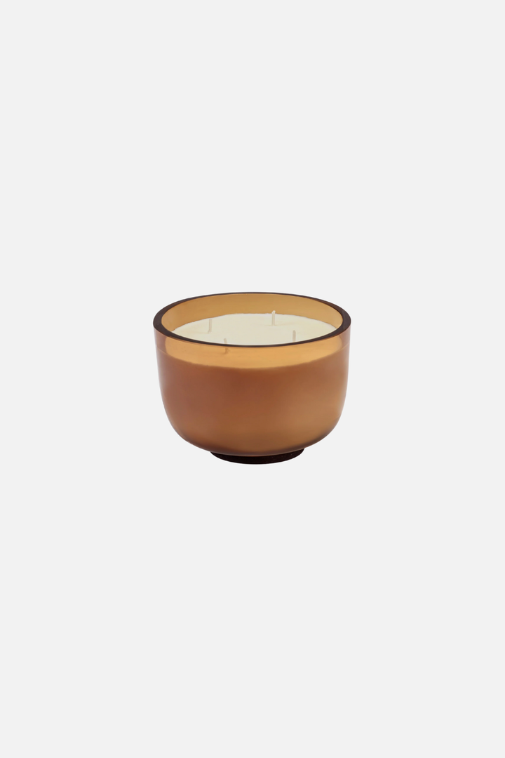 Serax Vincent van Duysen Candle in a brown glass holder on a white background