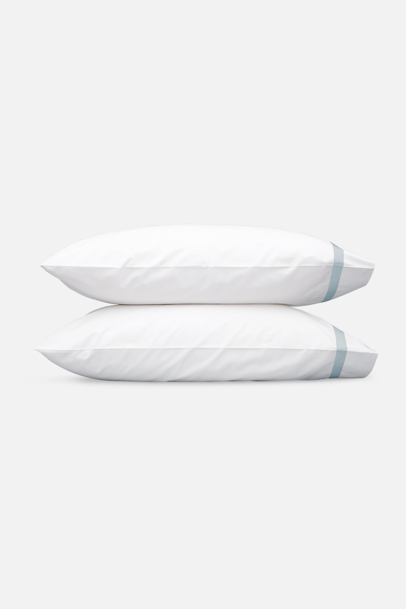 Two Matouk Lowell Pillows in Pool