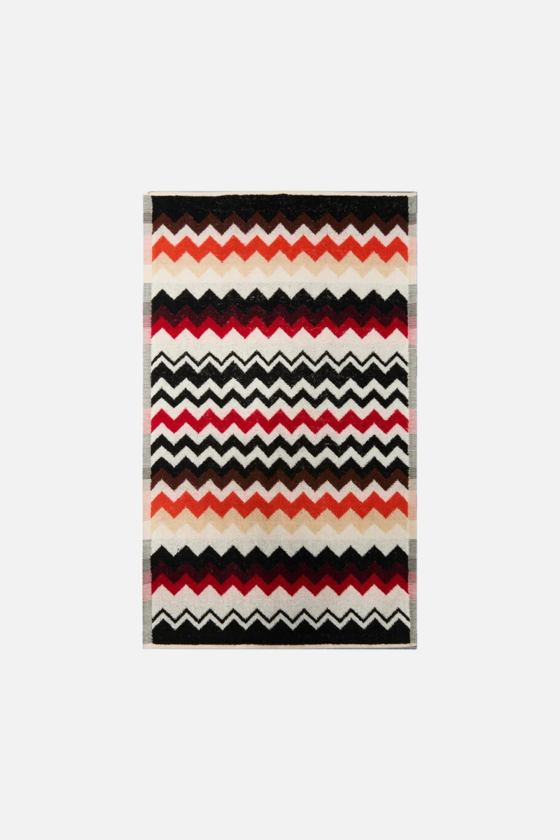 Best 156 Perrault striped bath mat with black, red, and beige pattern on a white background