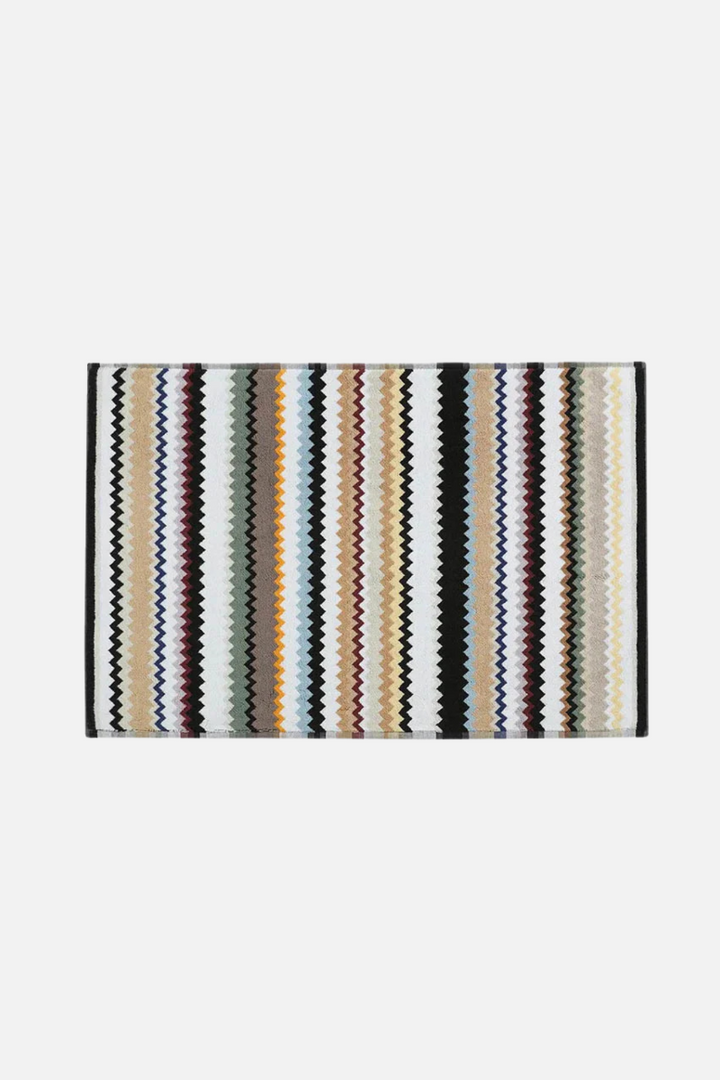 Perrault Curt 160 bath mat with striped pattern on a white background