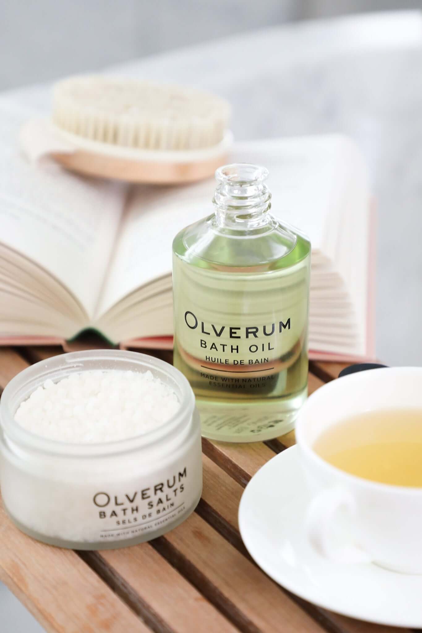 Olverum Bath Oil beside bath