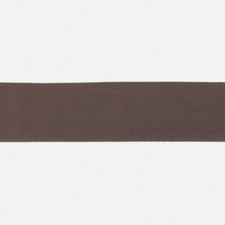 Close up of Matouk Lowell Bedding in Sable featuring Sateen Ribbon Detail